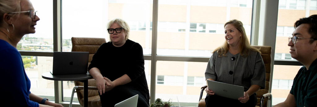 People collaborating in a meeting room